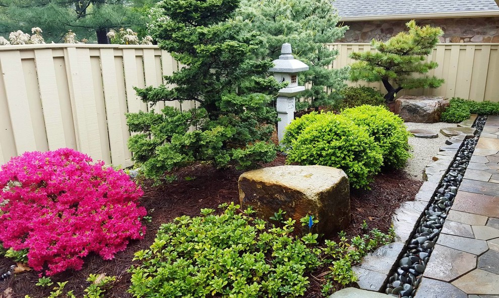 Design ideas for a small asian garden in Philadelphia with a garden path and natural stone pavers.