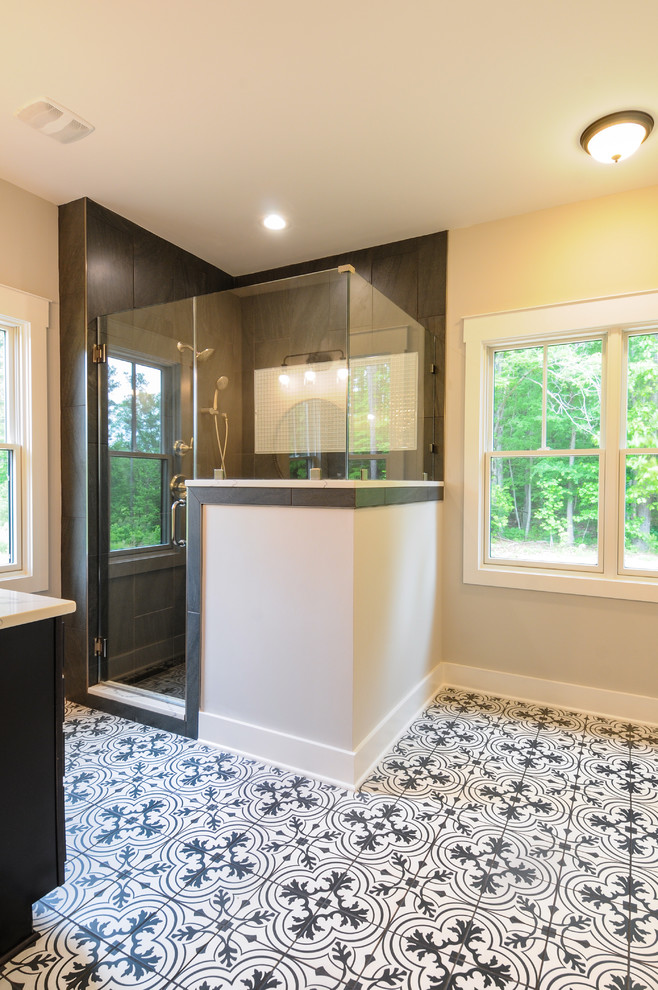 Large country master bathroom in Richmond with shaker cabinets, black cabinets, black tile, ceramic tile, granite benchtops, white benchtops, a two-piece toilet, ceramic floors, an undermount sink, multi-coloured floor, a hinged shower door and grey walls.