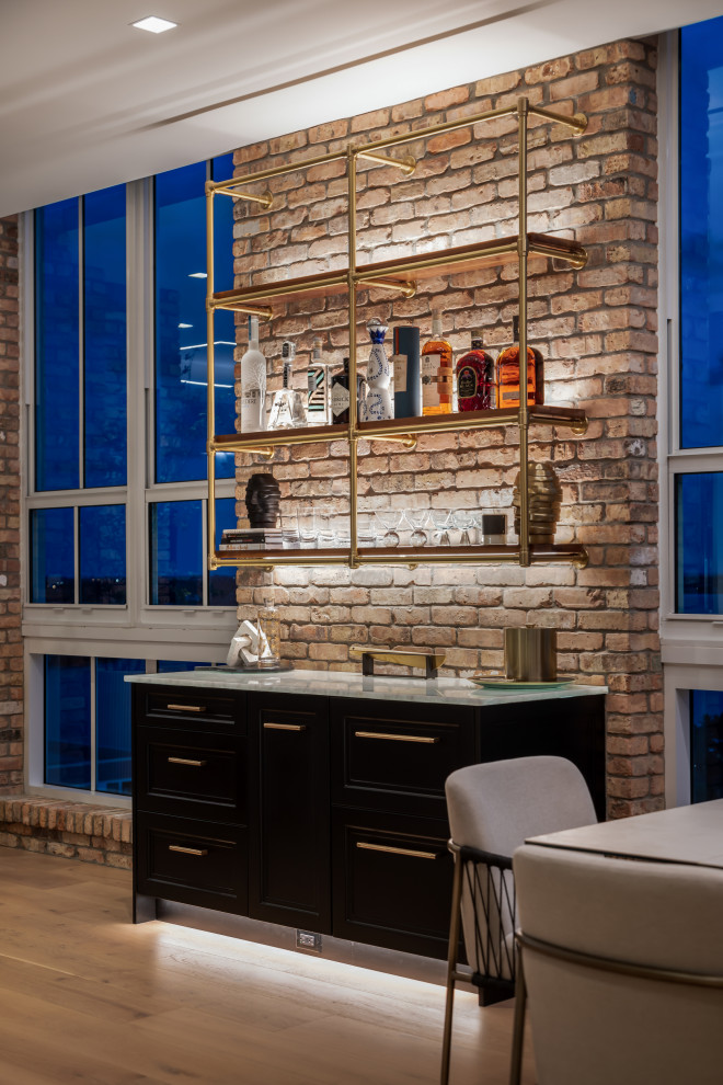 Design ideas for an industrial home bar in Tampa with a feature wall.