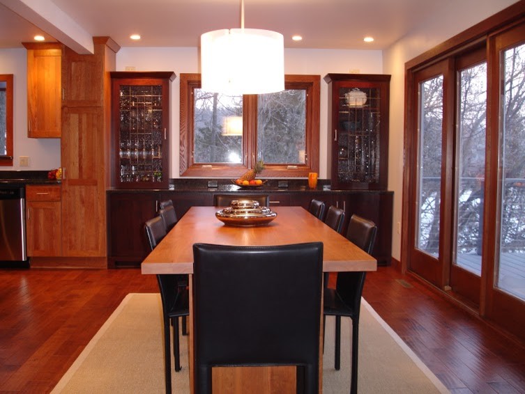 Kitchen/dining room combo - mid-sized modern medium tone wood floor kitchen/dining room combo idea