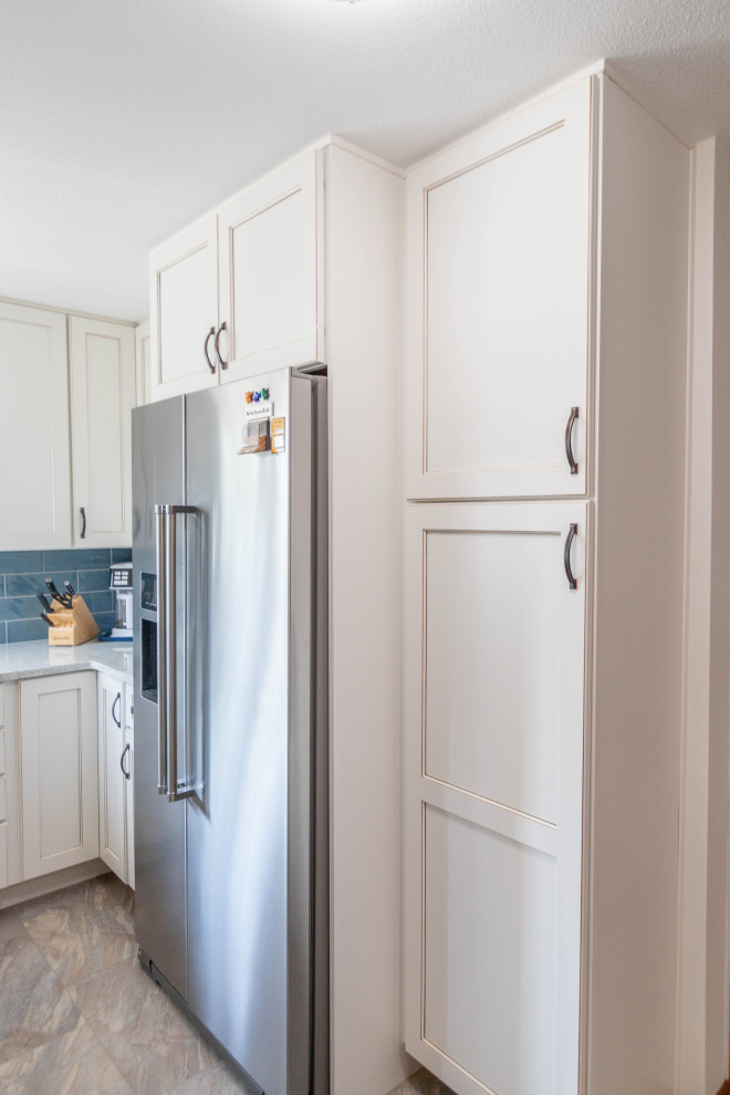 Kitchen - coastal kitchen idea in Denver