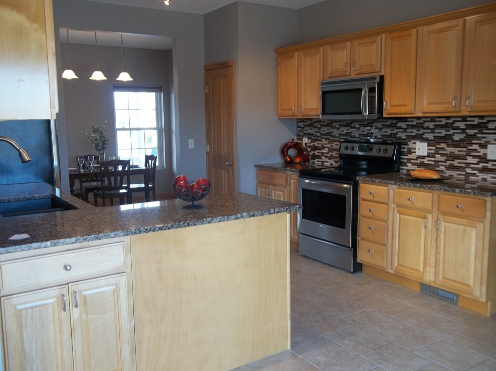 Kitchen - transitional kitchen idea in Cedar Rapids