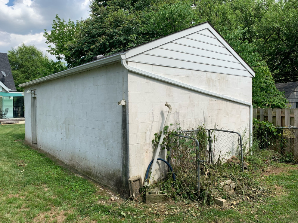 How should I get eroded ground back to grade (gravel? topsoil + seed?)