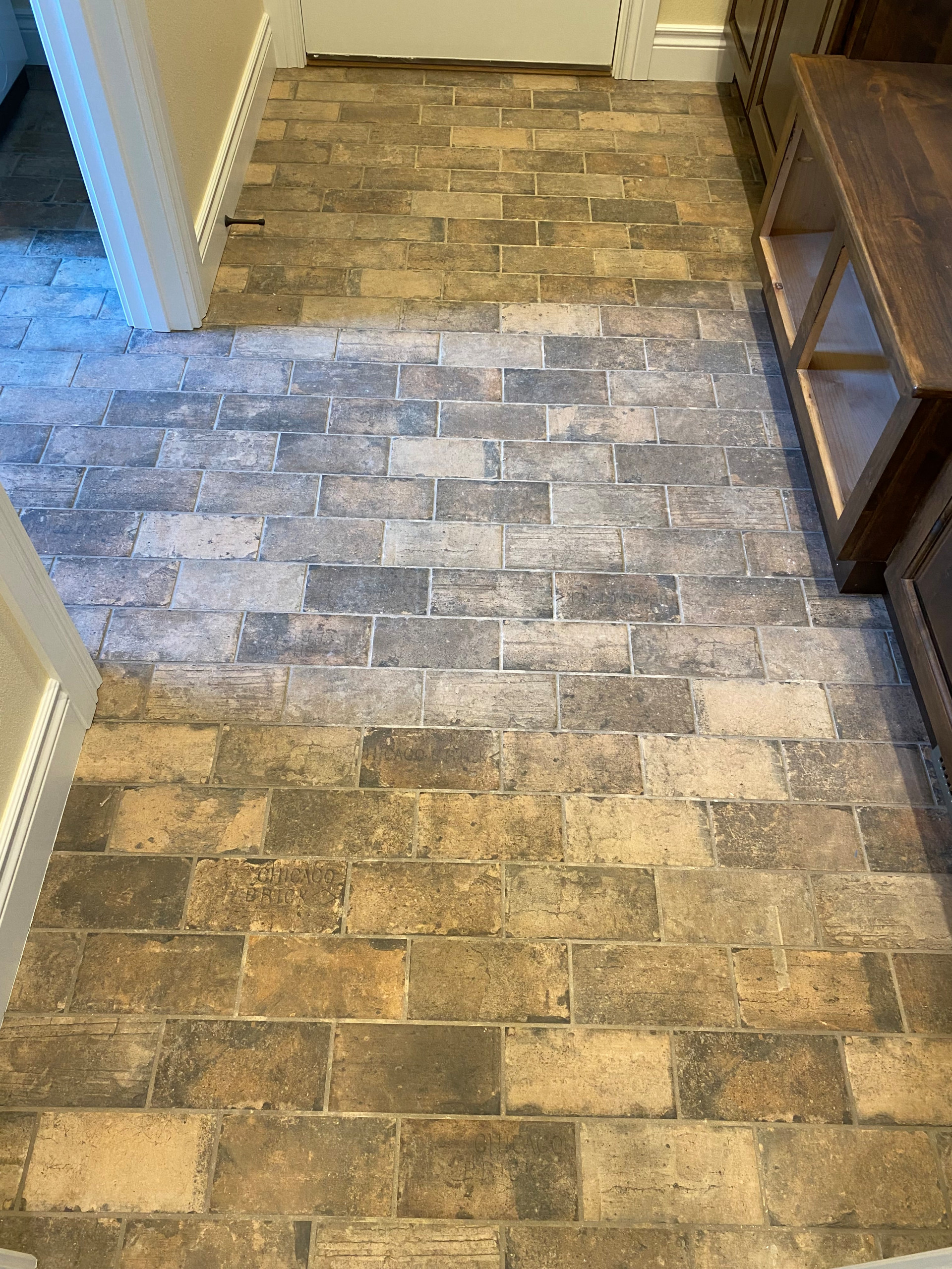 Brick tiled garage entry and laundry room floor