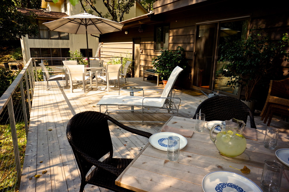 Inspiration for a large contemporary backyard deck in Minneapolis with no cover.