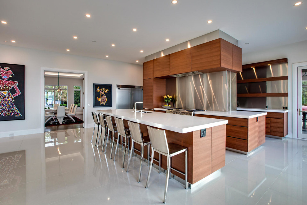 Design ideas for a contemporary separate kitchen in Toronto with an undermount sink, flat-panel cabinets, medium wood cabinets, metallic splashback, stainless steel appliances, multiple islands, white floor and white benchtop.