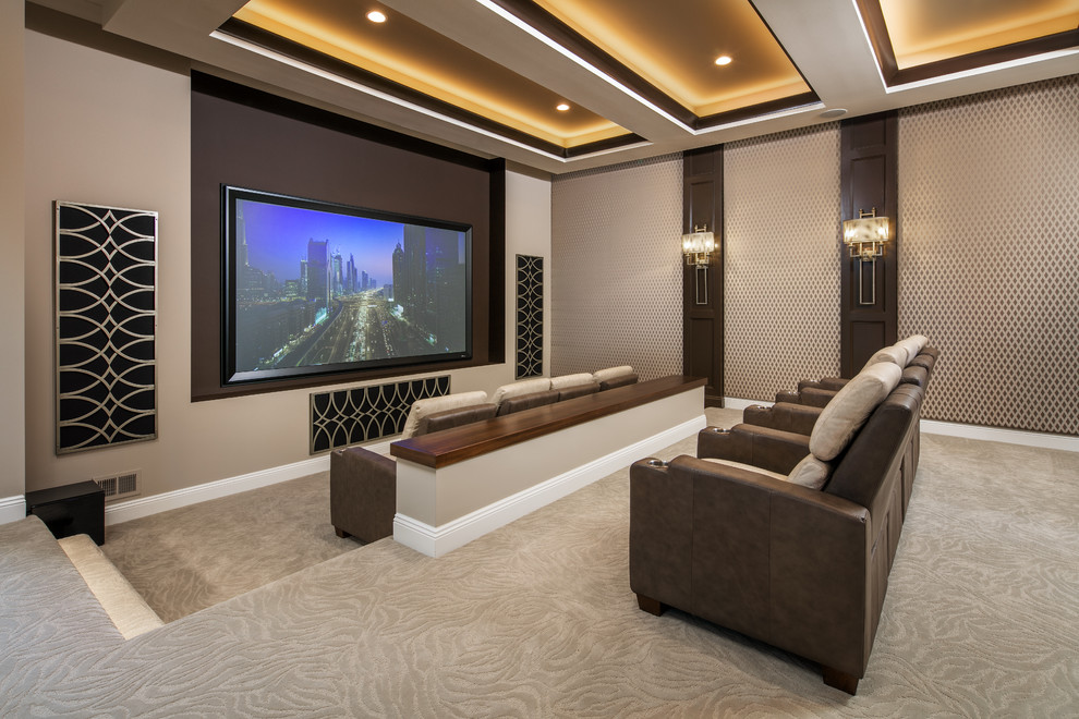 Large transitional open concept home theatre in Omaha with carpet, beige walls, a projector screen and beige floor.