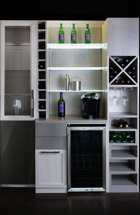 Inspiration for a small modern single-wall wet bar in San Francisco with no sink, open cabinets, grey cabinets, laminate benchtops, grey splashback and black floor.