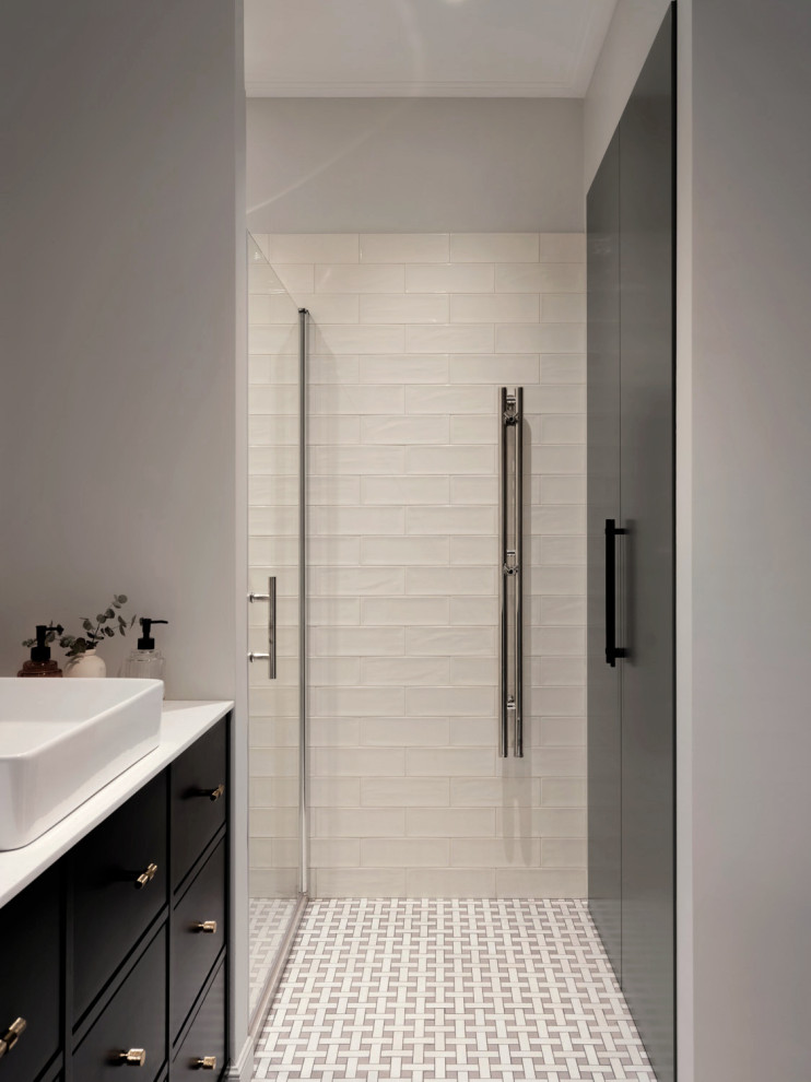 Bathroom - contemporary beige tile and ceramic tile gray floor and single-sink bathroom idea in Moscow with black cabinets, a wall-mount toilet, a drop-in sink and white countertops
