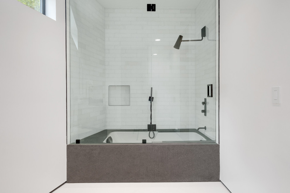 Design ideas for a mid-sized modern master bathroom in Los Angeles with a shower/bathtub combo, white tile, ceramic tile and brown benchtops.