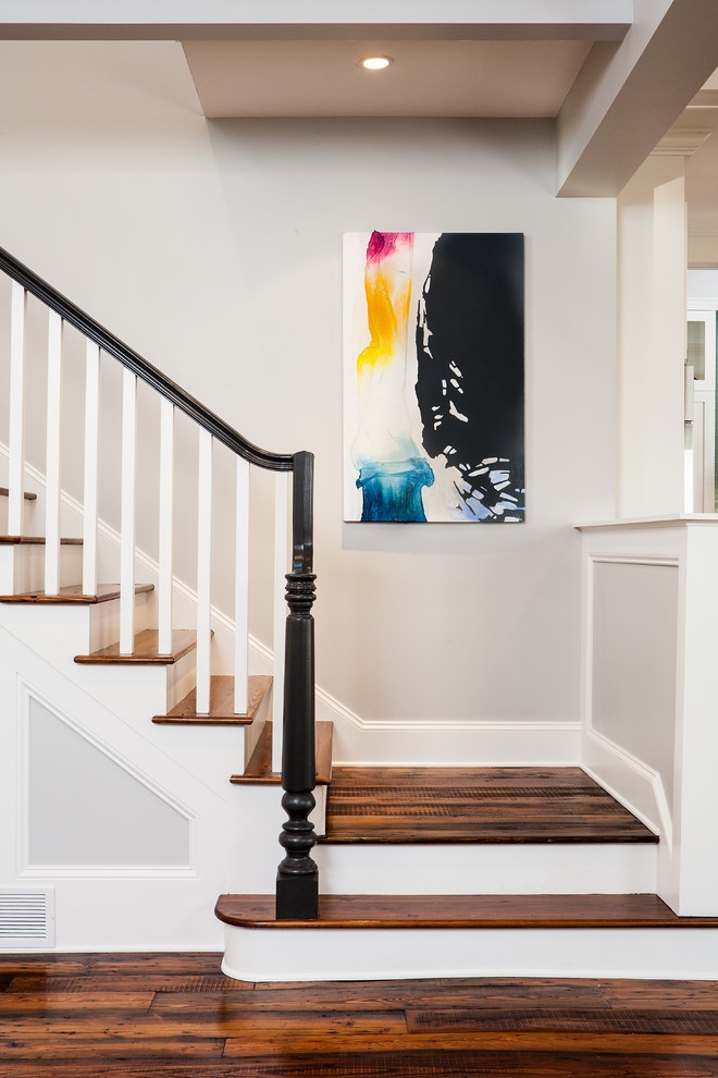 Photo of a traditional wood staircase in Atlanta with painted wood risers.