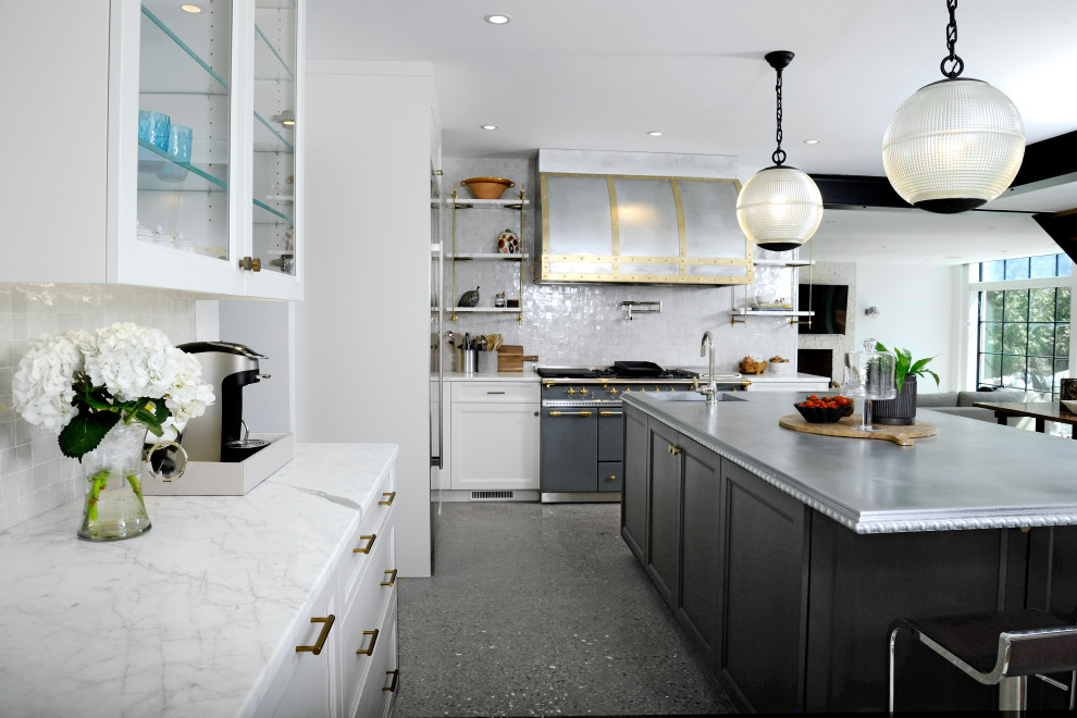 Design ideas for a mid-sized industrial u-shaped separate kitchen in New York with flat-panel cabinets, black cabinets, zinc benchtops, with island and white benchtop.
