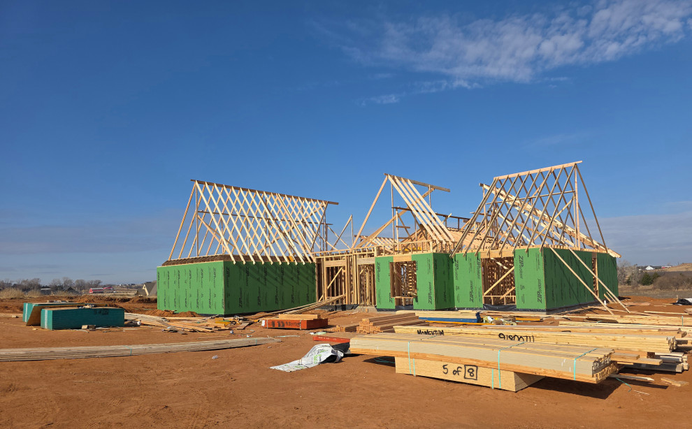 Front of the home with roof going up