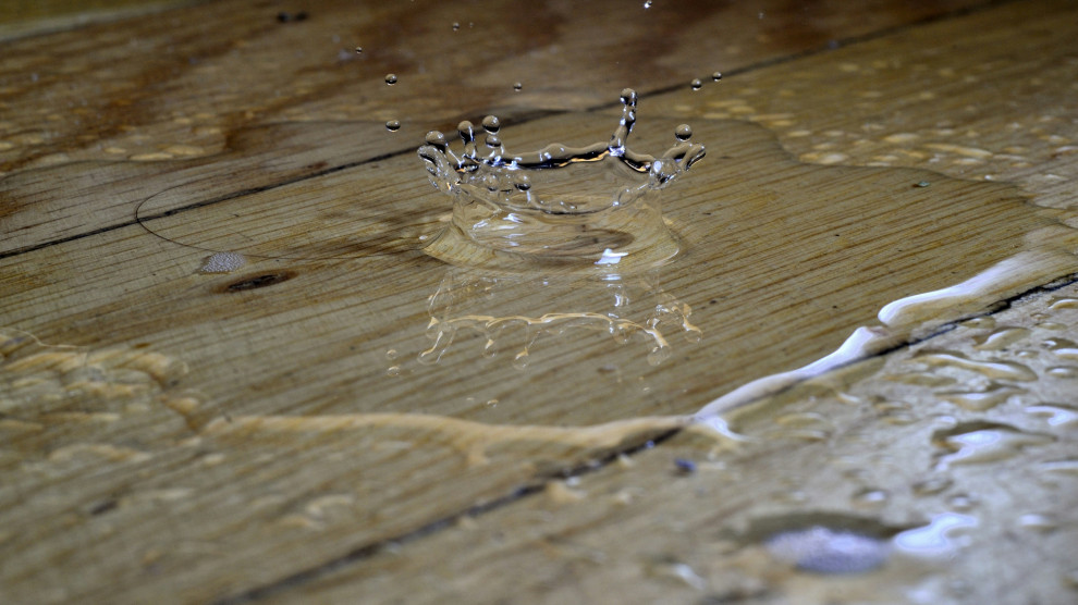 Water dripping on hardwood floor