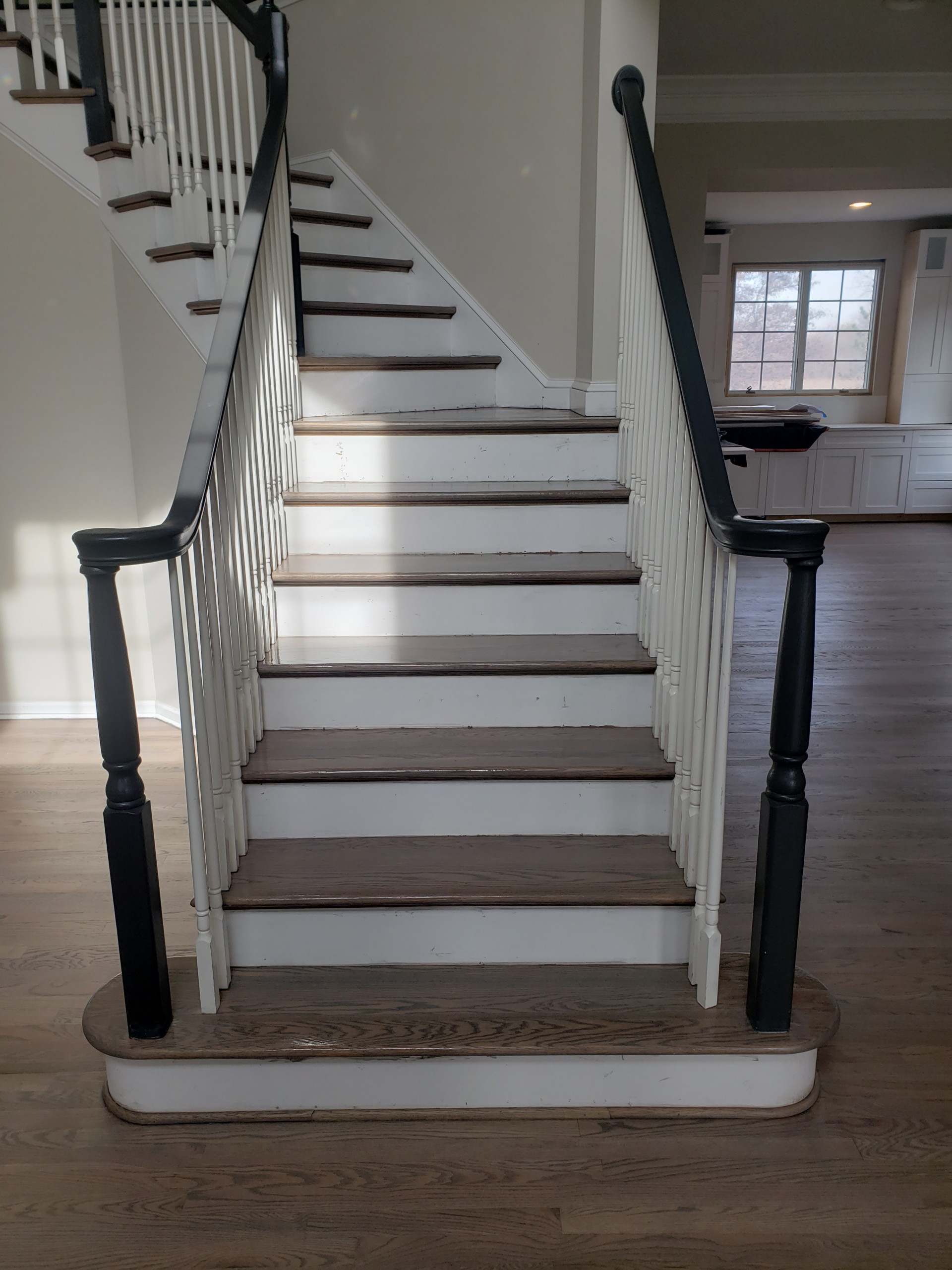 New 2 and 1/4 red oak flooring installed and old flooring refinished