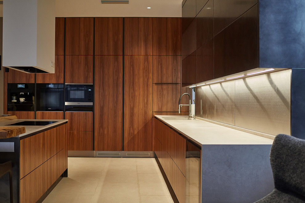 This is an example of a large contemporary l-shaped open plan kitchen in Other with flat-panel cabinets, medium wood cabinets and with island.