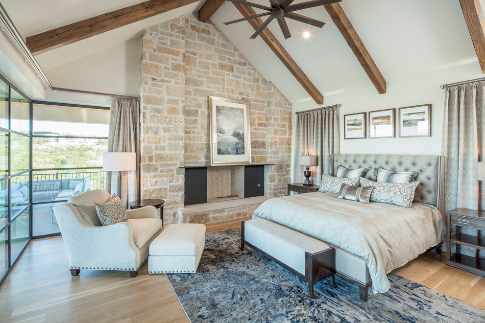 Example of a transitional bedroom design in Austin
