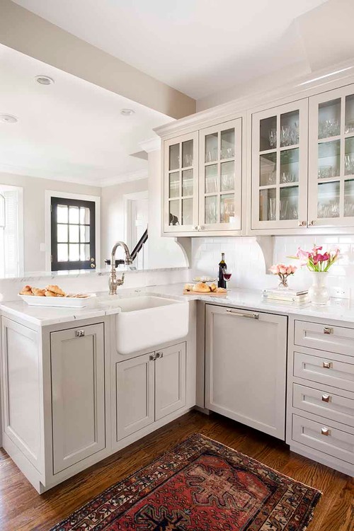 Transitional kitchen featuring pewter/nickel hardware and faucet