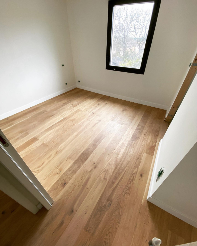 Pose d’un parquet collé en lame