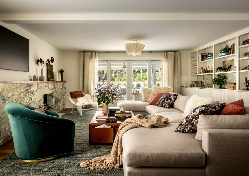 Example of a country family room design in New York