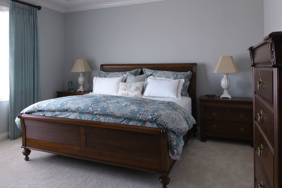 Inspiration for a mid-sized transitional master bedroom in Indianapolis with blue walls, carpet and no fireplace.