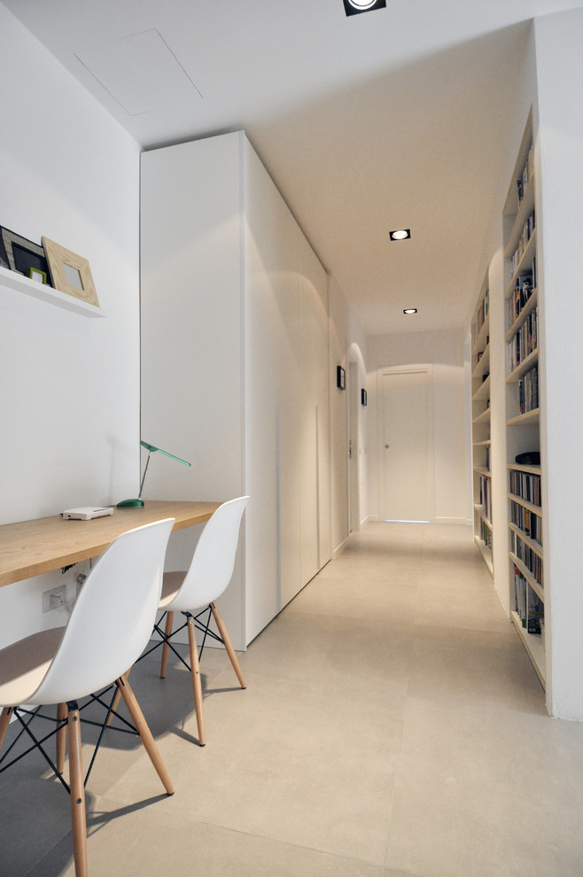 Mid-sized scandinavian hallway in Other with white walls, ceramic floors and grey floor.