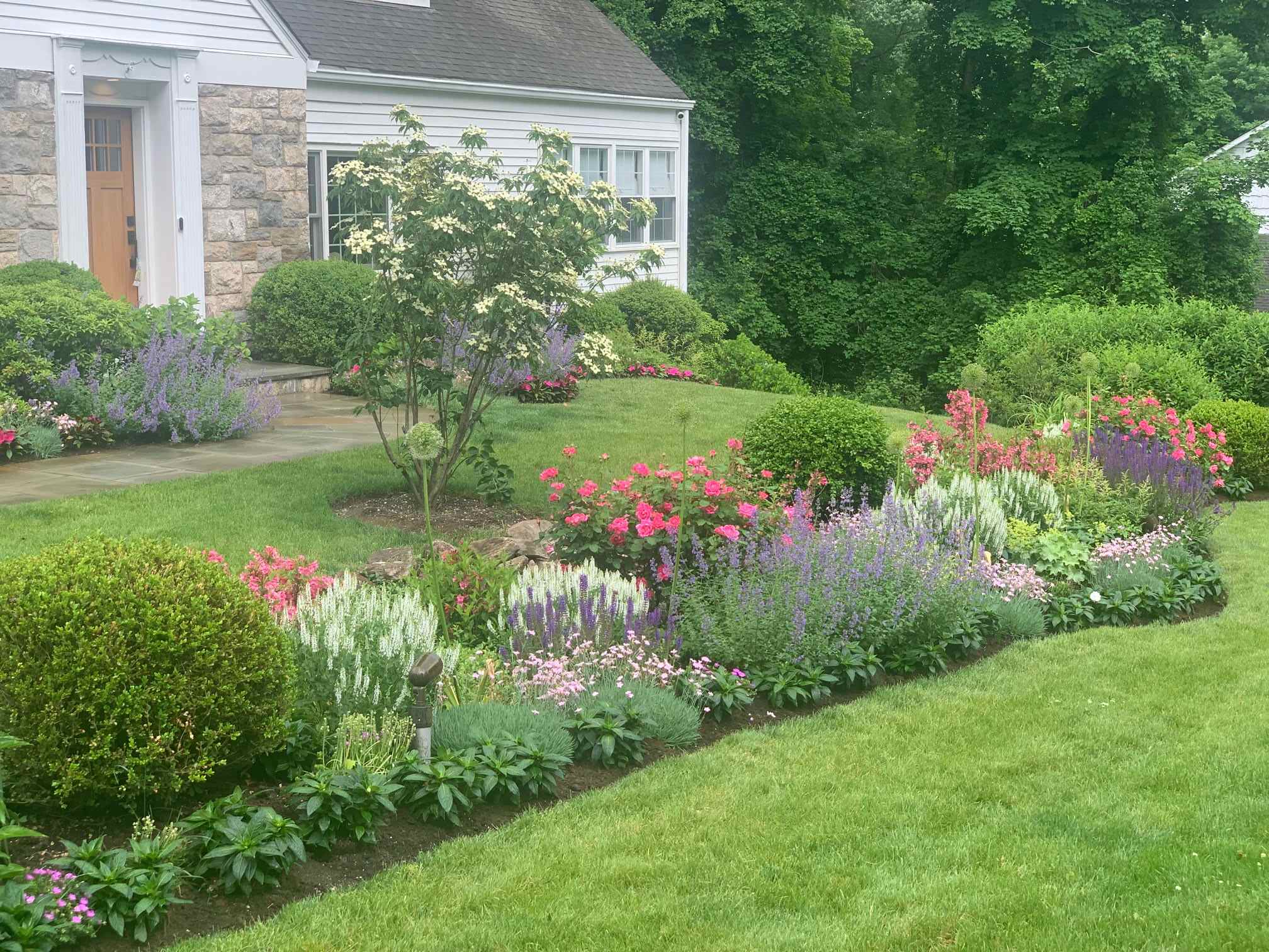 Perennial Garden Border Welcome  Homeowner after a Busy day in the City by Peter Atkins and Associates