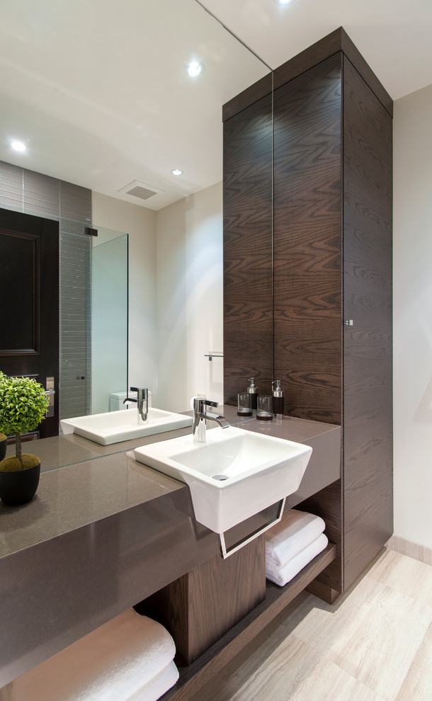 Photo of a contemporary bathroom in Vancouver with open cabinets, dark wood cabinets and ceramic floors.