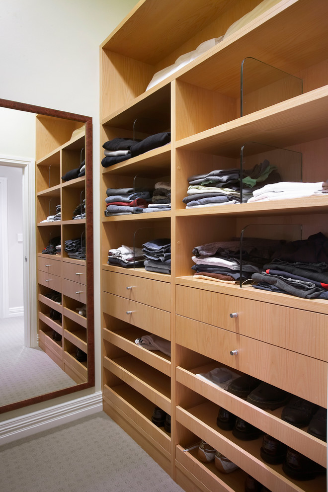 Design ideas for a traditional walk-in wardrobe in Perth with light wood cabinets, carpet and grey floor.