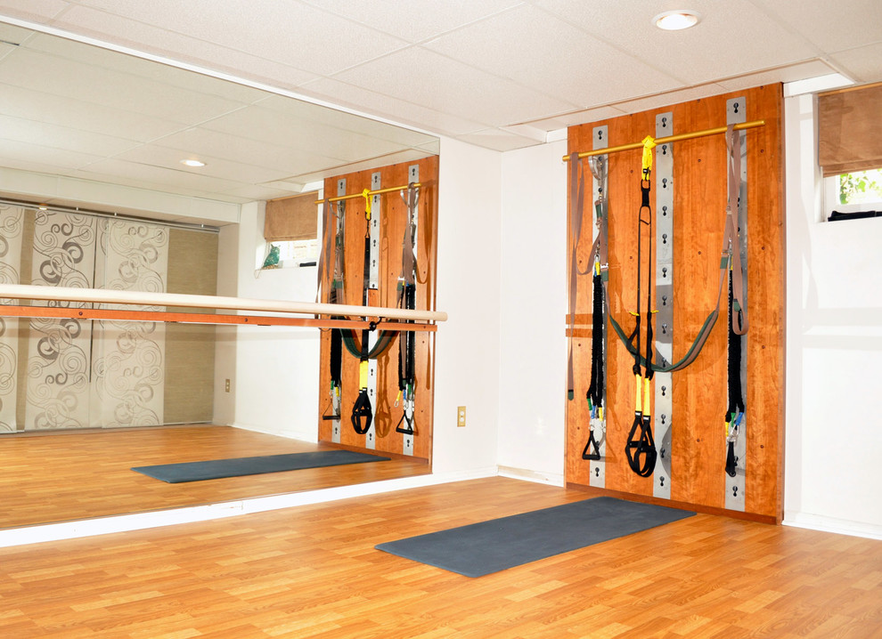This is an example of a contemporary home gym in Cleveland.
