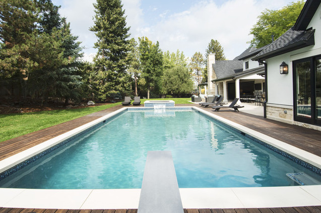 Pool - huge transitional mixed siding white pool idea in Denver with a hip roof and a shingle roof