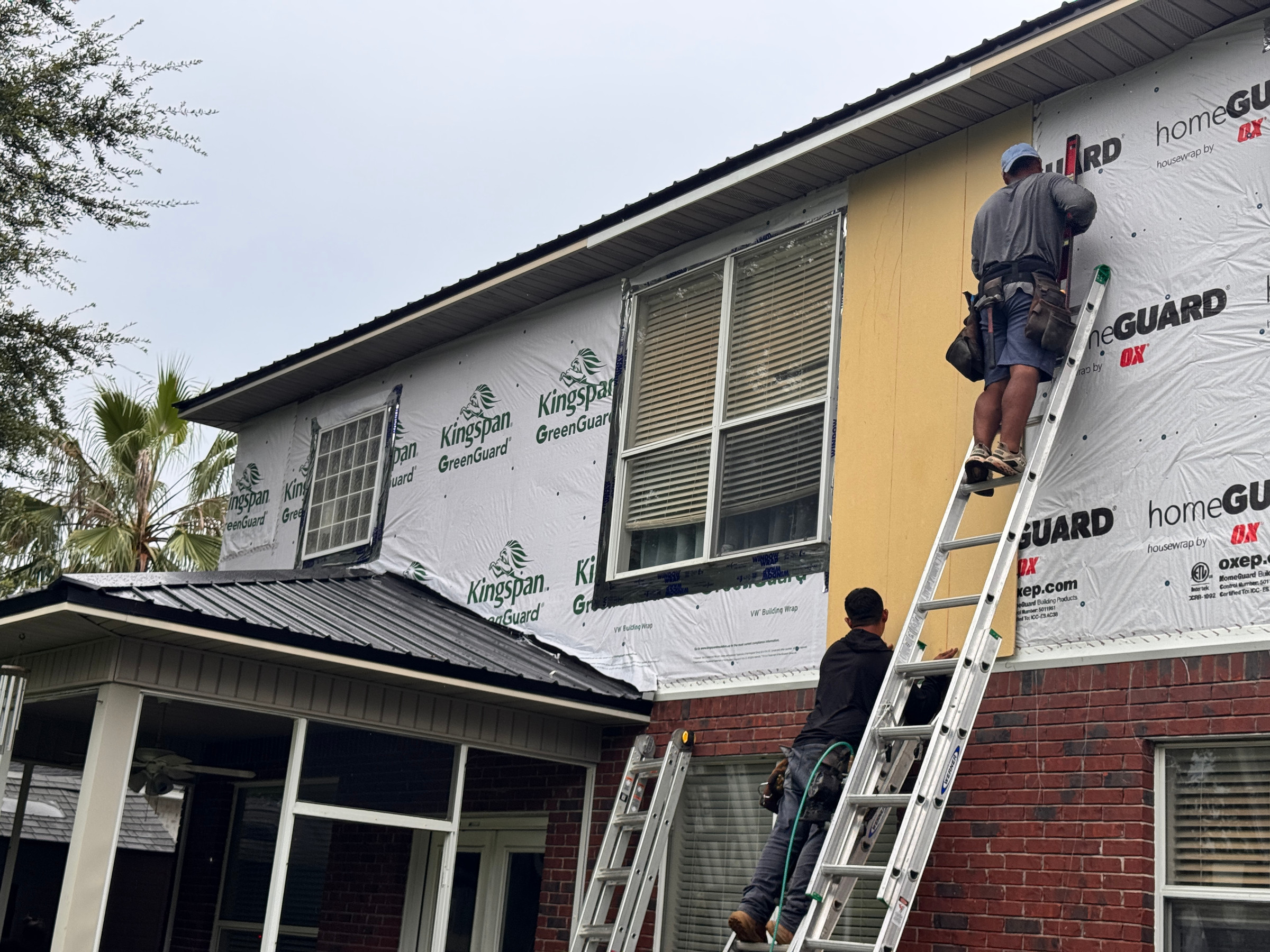 Siding installation in progress