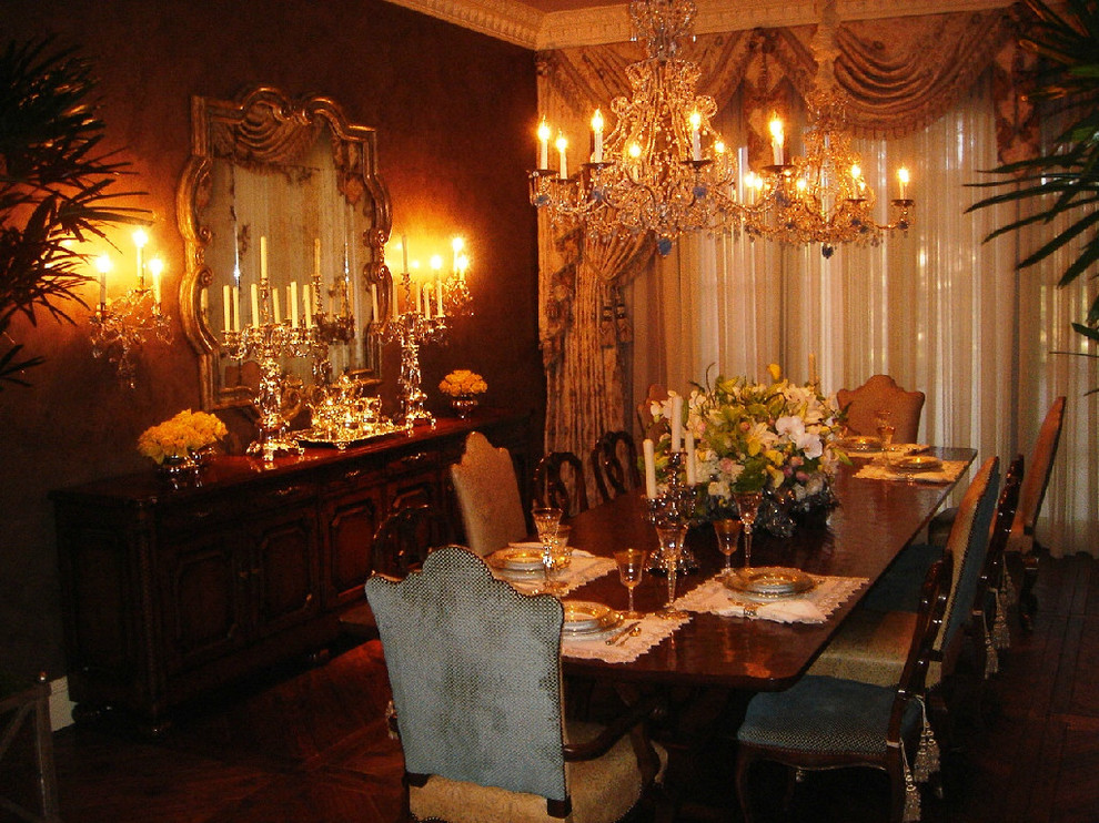 Inspiration for a mid-sized medium tone wood floor enclosed dining room remodel in Las Vegas with brown walls
