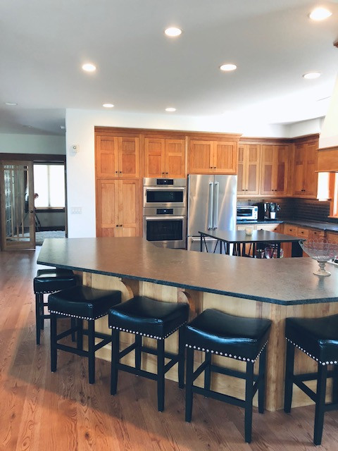 Transitional home design photo in Denver
