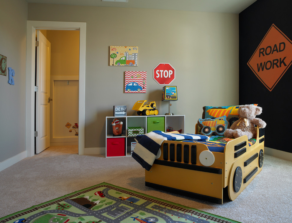 Inspiration for a mid-sized transitional kids' room for boys in Other with green walls and carpet.