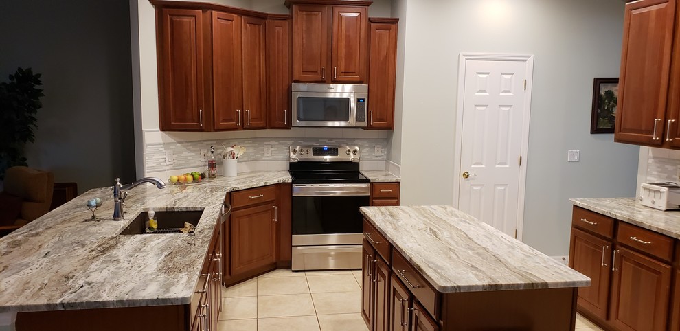 Example of a transitional kitchen design in Orlando