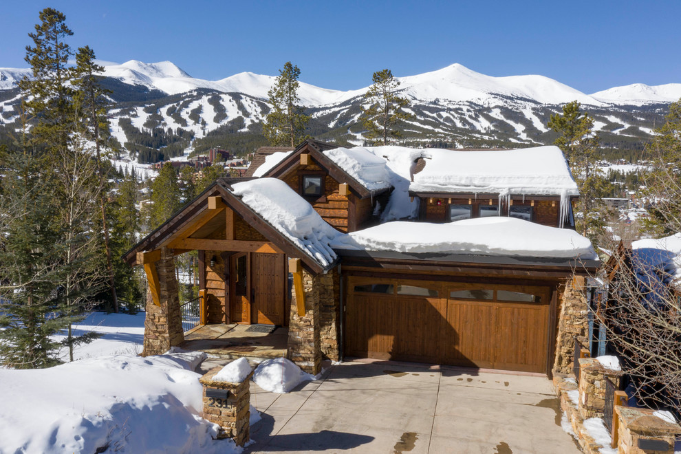 Mountain style home design photo in Denver