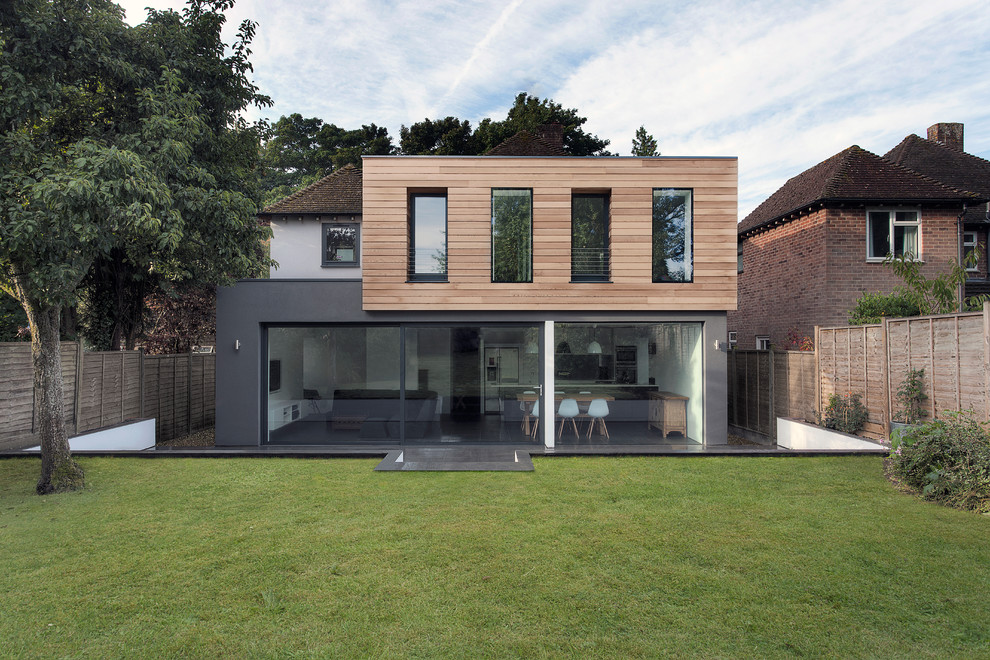 Photo of a mid-sized contemporary two-storey exterior in Hampshire.