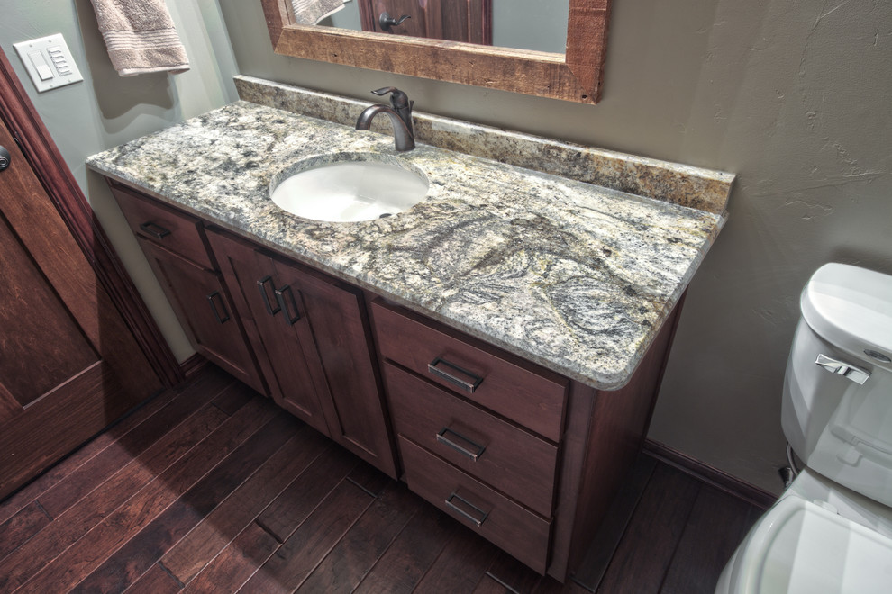 Design ideas for a large traditional bathroom in Other with a drop-in sink, recessed-panel cabinets, dark wood cabinets, engineered quartz benchtops and ceramic floors.