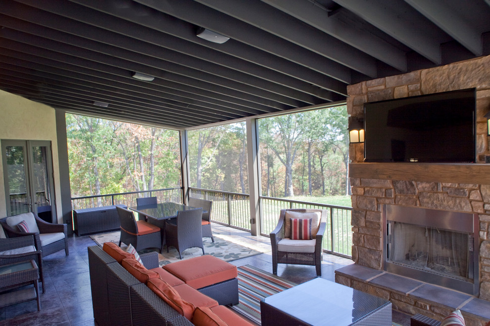 This is an example of an expansive modern sunroom in Other with terra-cotta floors, a standard fireplace, a stone fireplace surround and a standard ceiling.