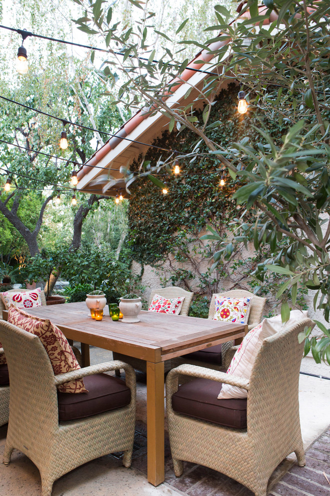 Inspiration for a mediterranean patio in Los Angeles with a vertical garden.