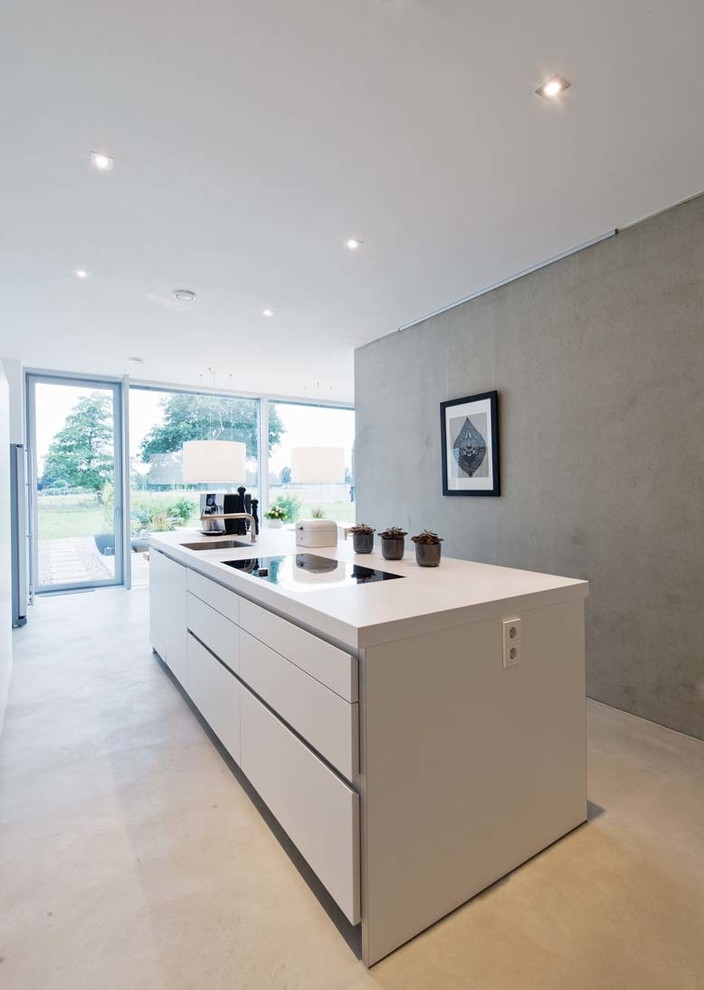 Photo of a large contemporary open plan kitchen in Hanover with a single-bowl sink, flat-panel cabinets, white cabinets and with island.