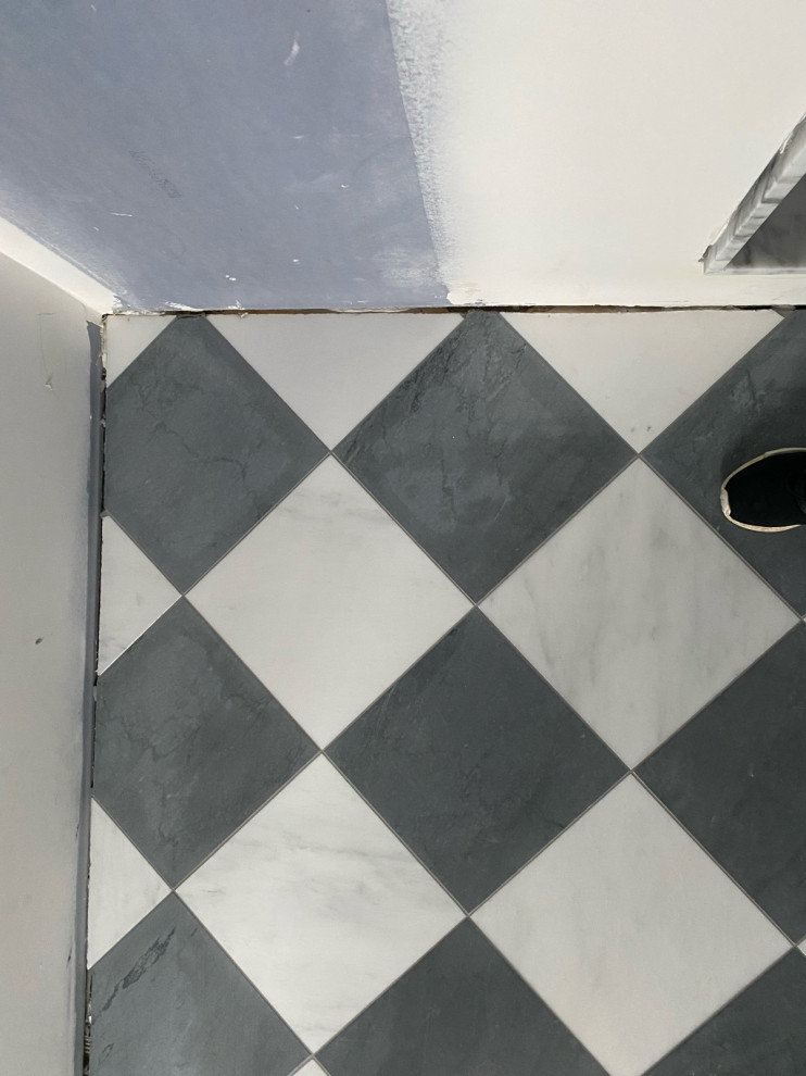 Marble floor tile discoloration
