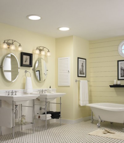 Design ideas for a large traditional master bathroom in Minneapolis with a claw-foot tub.