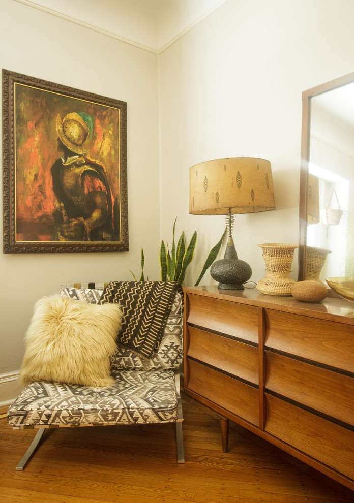 This is an example of an eclectic bedroom in New York.