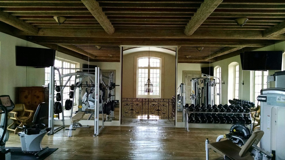 Inspiration for an expansive home weight room in Houston.