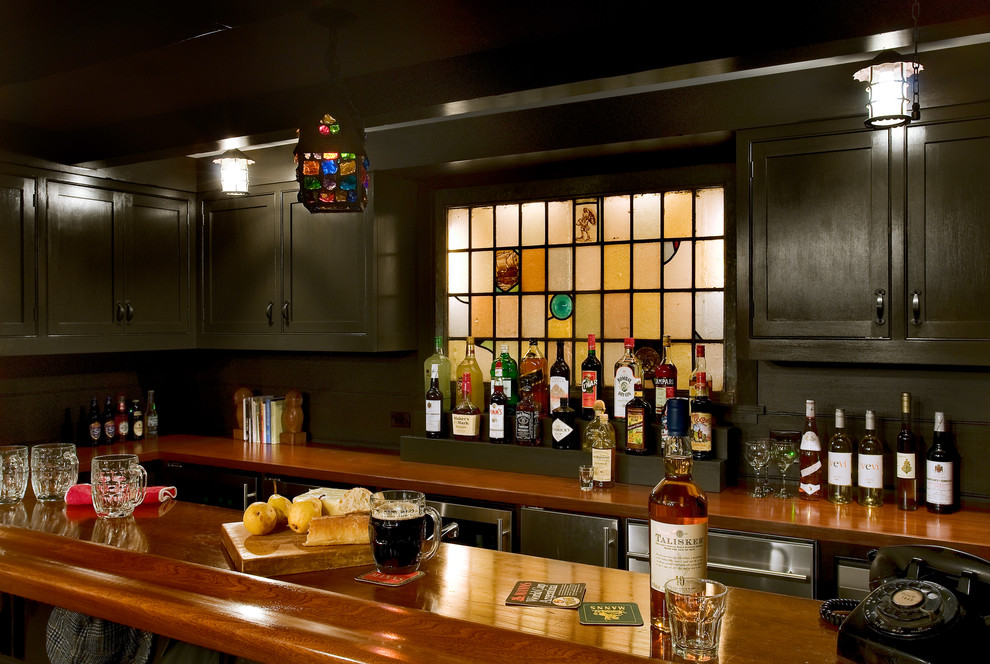 Design ideas for a traditional home bar in New York.