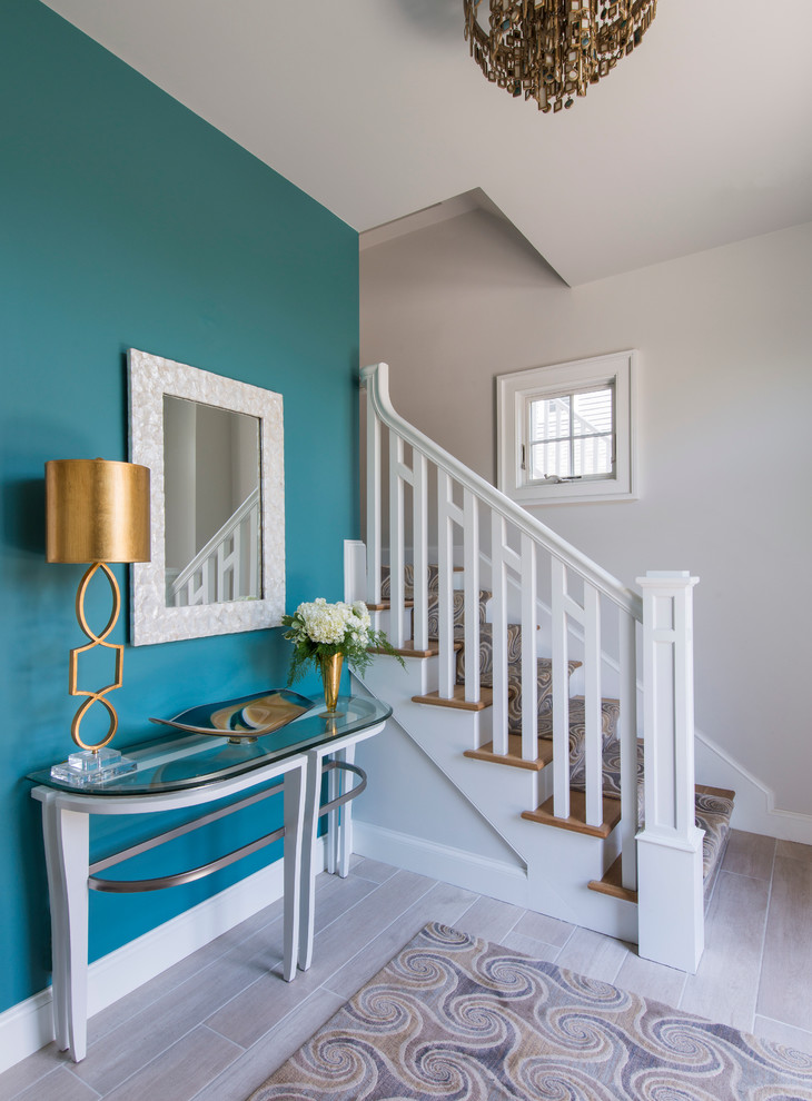 Mid-sized beach style foyer in Providence with blue walls, a single front door and a glass front door.