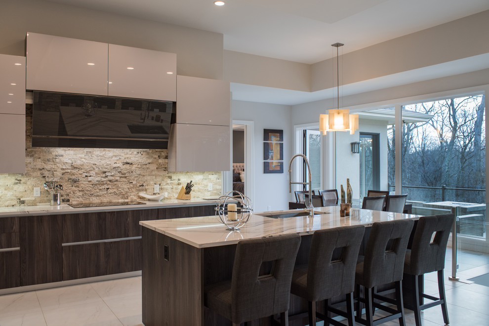 This is an example of a mid-sized modern l-shaped eat-in kitchen in Other with an undermount sink, flat-panel cabinets, dark wood cabinets, quartzite benchtops, beige splashback, stone tile splashback, stainless steel appliances, marble floors, with island and white floor.
