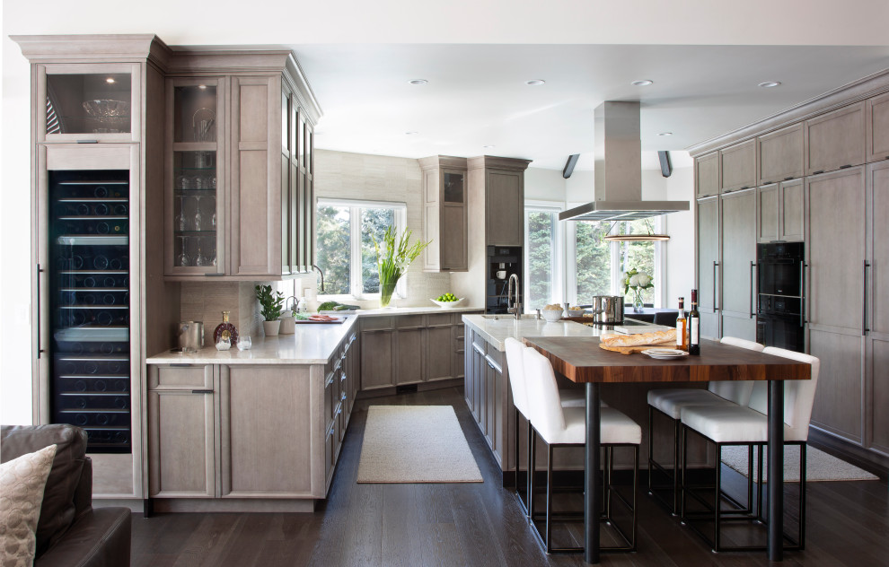 Example of a transitional kitchen design in Denver